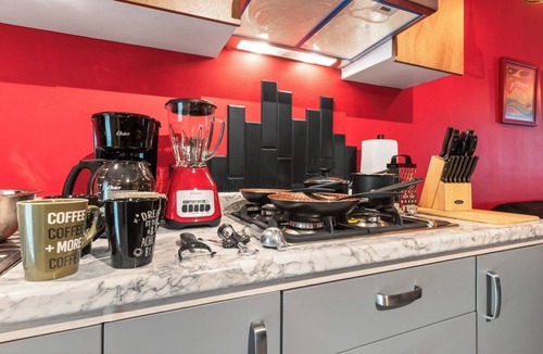 Durango Apartment | Red Vibe Music Decor | King Bed + Parking + Office