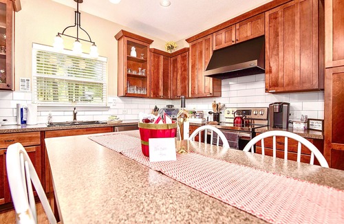 Trinity House | Riverfront home with hot tub, playground, kayaks, and amazing panoramic views!