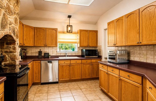 Seguin House | Riverfront retreat w/wraparound deck, Movie Room, Firepit