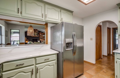 Granbury House | Rockstar waterfront lake house! Mid century modern with large 2 story party deck