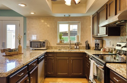 Entertainment District House | Scott Casa - Walkable location, inviting patio, vibrant space!