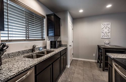 Kingman House | Sleek & Modern Triplex | Private Yard & Top Amenities