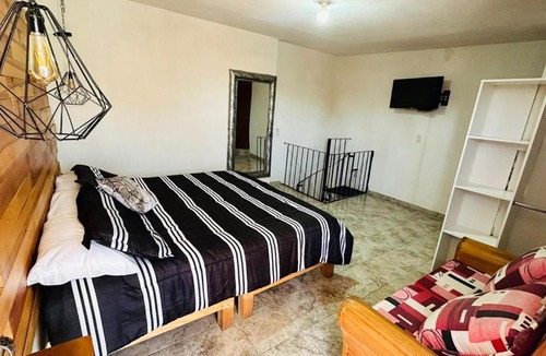 Bernal Apartment | Sol de Peña Apartment with balcony and downtown view