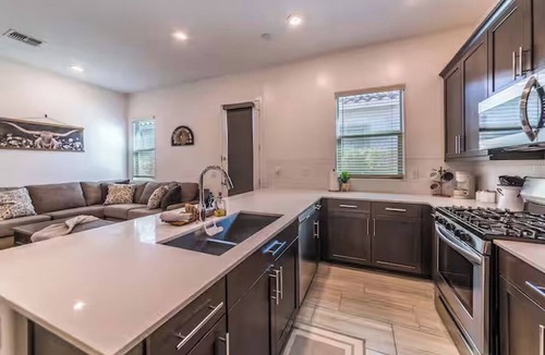Sunset Farms House | Spacious 4-bedroom house in lovely Tolleson w/2 Full Kitchens & 2 laundry rooms