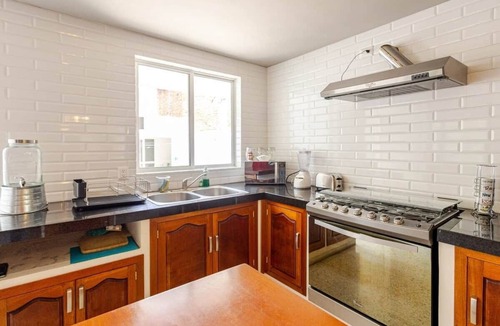 Centro House | Spacious 4BR Home with Parking | Open-Air Patio