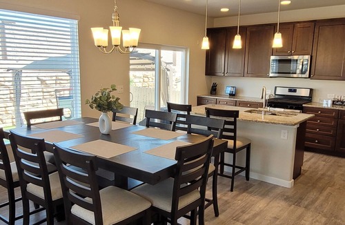 Colorado Springs House | Spacious 5-BR Home: Private Hot Tub & Big Yard, Stocked Kitchen, Mountain View!