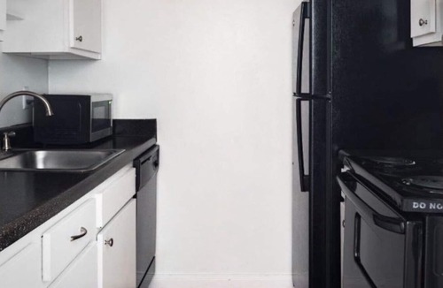 The Galleria Apartment | Spacious and Modern Hotel Suites with Heated Pool, Gym and Hot Tub!