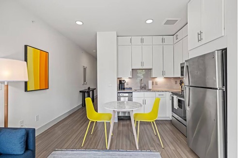 Waller Creek District Hotel | Spacious Apartment for Long-Term Comfort in Downtown Austin | Kitchen & Pool