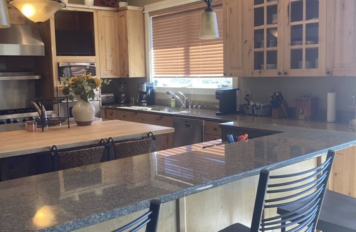 Big Sky Meadow Village Condo | Spacious Condo on Golf Course & Creek w/hot tub