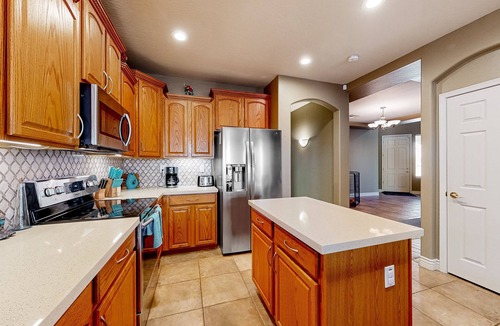 Litchfield Park House | Spacious home surrounded by palms with pool, grill, children's items, & W/D