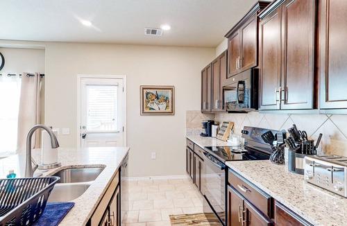 Wetmore House | Spacious home with private yard, patio, grill, AC, & private W/D