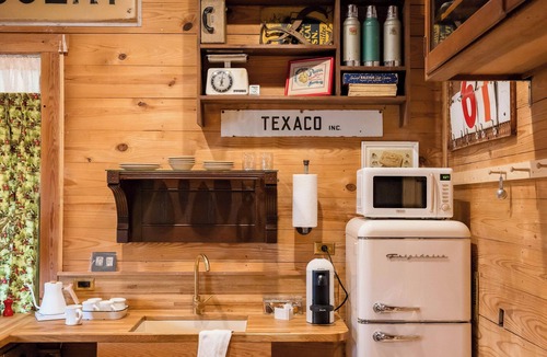 Bangs House | Stay in a Restored 1940s Texaco Station with Spa Bath & Oak Courtyard