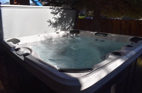 Whitefish Condo | Stylish Downtown Whitefish Condo I Private Hot Tub I Prime Location