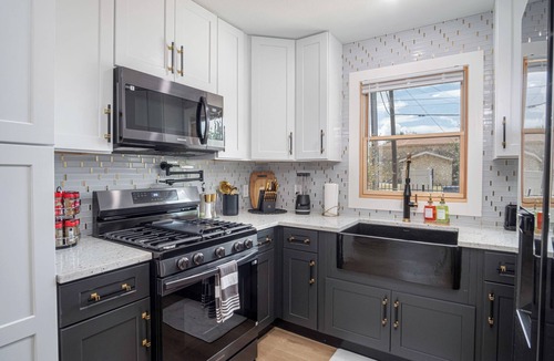 Eastside Promise Neighborhood House | Stylish Stay with Unforgettable Downtown Views!