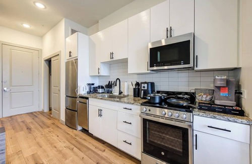 Washington Ave./ Memorial Park Apartment | This inviting living space is the perfect spot to relax and unwind