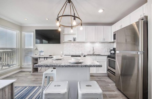 Galveston Condo | Trendy Beach Condo- Sunset views, Sandy Toes, Surfing more. (1304)