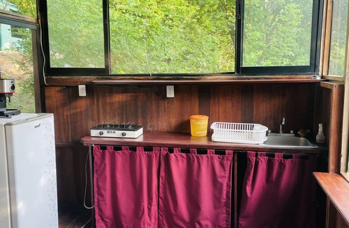 Cuatunalco House | triple and kitchen