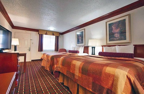 Decatur Hotel | Two Convenient Room Located at I-28 | Outdoor Pool & Free Parking