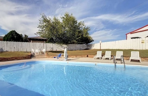Decatur Hotel | Two Convenient Room Located at I-28 | Outdoor Pool & Free Parking