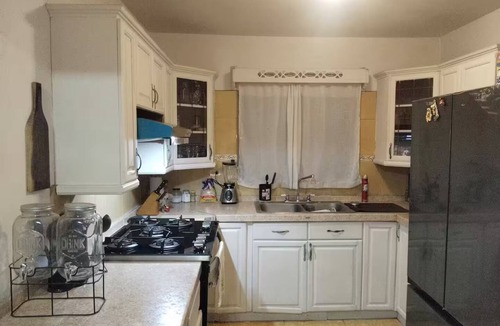 Chihuahua House | two-story house in gated community.