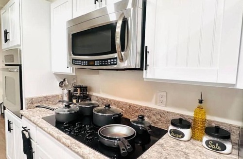 Southeast House | Ultimate Denver Getaway < Sleep 16 > Hot Tub, Fire Pit, Game Room & Home Gym