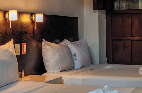 Centro Hotel | Vibrant Three Room Retreat Steps from Downtown’s Culture, Dining & Nightlife