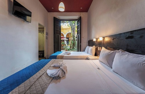Centro Hotel | Vibrant Three Room Retreat Steps from Downtown’s Culture, Dining & Nightlife