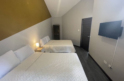 Zona 10 Hotel | Villas Santander