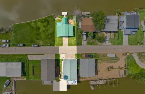 Freeport House | Waterfront beach house with the ultimate game room and two docks