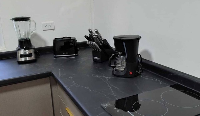 A modern one bedroom apartment in charming Sumpango's forest awaits you