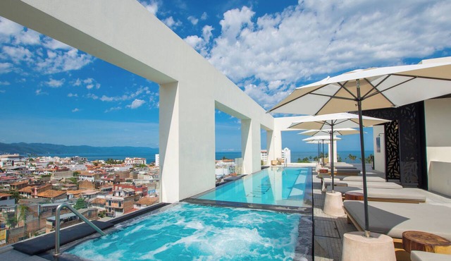 Blissful Ocean-View Penthouse with Rooftop Pool