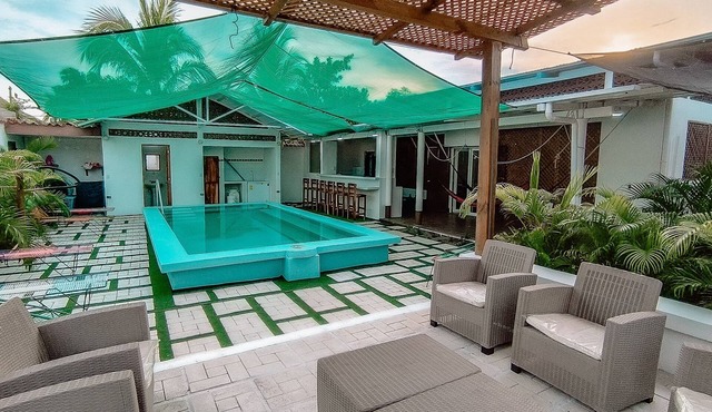 Charming 2-bedroom house with WiFi, Pool, and AC in enchanting Monterrico.