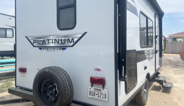 Cozy camper with full hookups, free parking, and free Wifi!