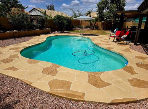 Cozy home with pool, fire table, BBQ, RV parking