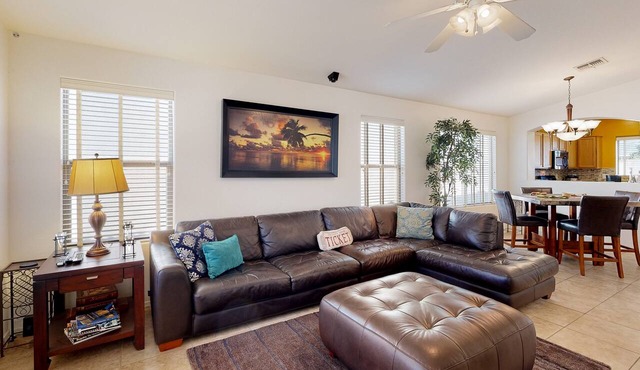 Desert oasis with an enclosed yard, firepit, washer/dryer, and central AC