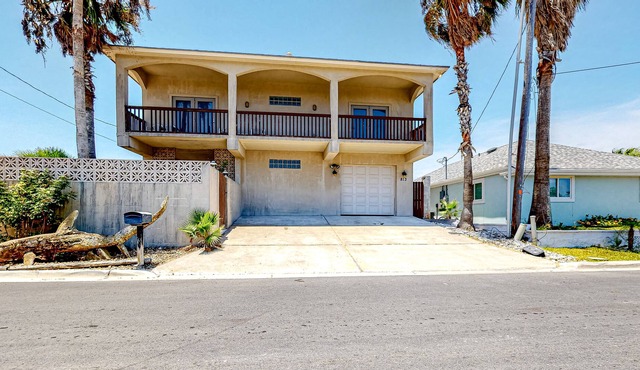 Dog-friendly escape on the canal with furnished deck, beach access nearby, & AC