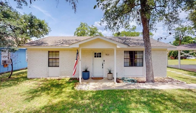 Dog-friendly waterfront home with dock, grill, water views, patio, washer/dryer