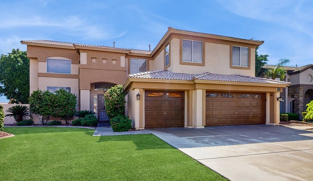 Exquisite home with firepit, game room, heated pool, pool spa, & putting green