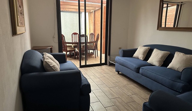 Family friendly accommodation with 12 beds, garage and garden in zona 14n