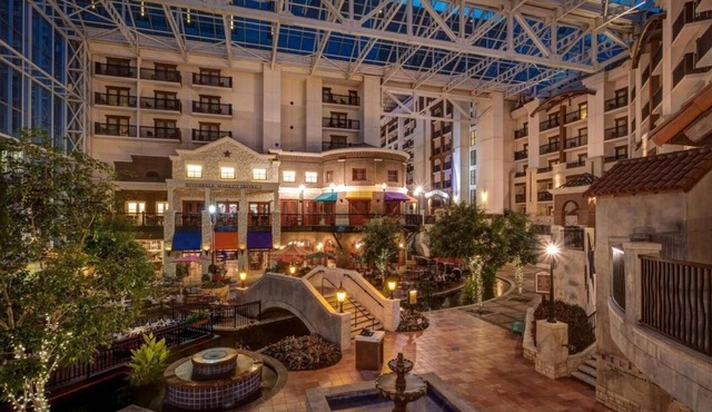 Featuring a 10-acre outdoor pool facility and a European-style spa .