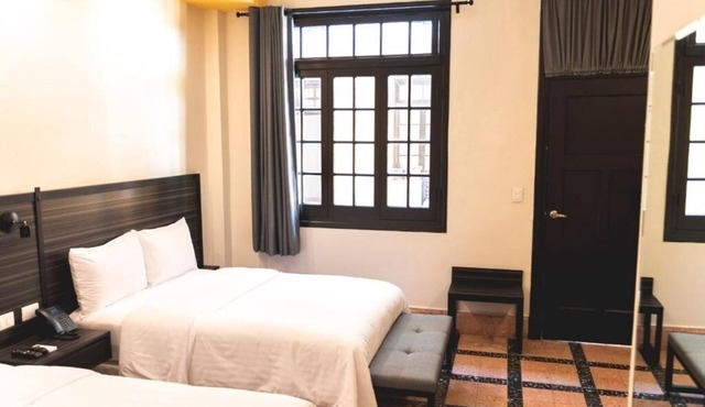 Group Getaway in Mérida – Two Double Rooms w/Poolside Relaxation & Courtyard