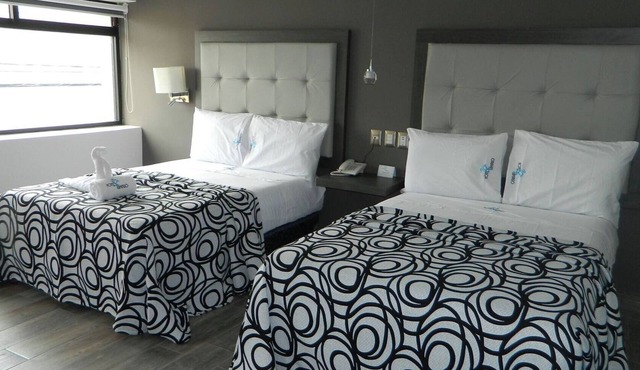 Kick Off Your Action-Packed Getaway Here: 2 Rooms Designed to Unwind and Enjoy!
