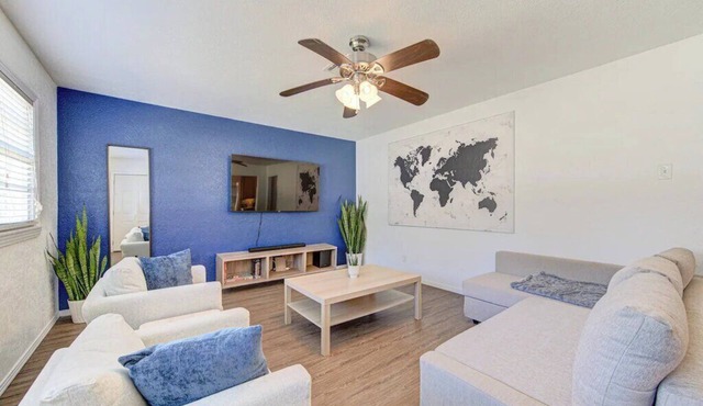 King bed with Pool table, decked patio and, gym.