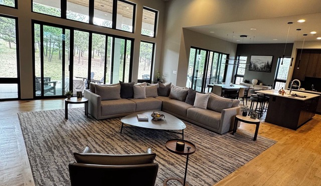 Luxury 6BR Mountain Retreat | Sleeps 20 | Theater, Hot Tub & Fire Pit Spacious 4,500 sq ft home perfect for large groups, weddings & retreats near the Air Force Academy. Enjoy a private acre, entertainment basement, outdoor living, peaceful Mtn