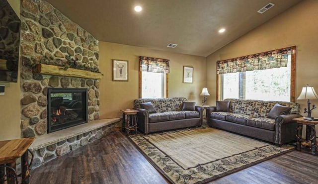 Modern dog-friendly cabin with hot tub, gas fireplace, patio, grill, & W/D in Conover