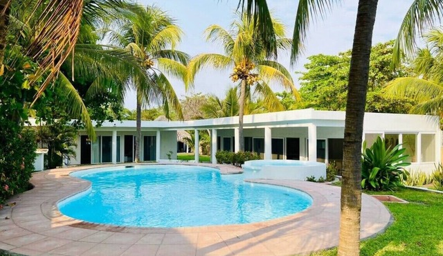 Ocean access waterfront home with TIKI Ranch and Pool. Pet friendly!