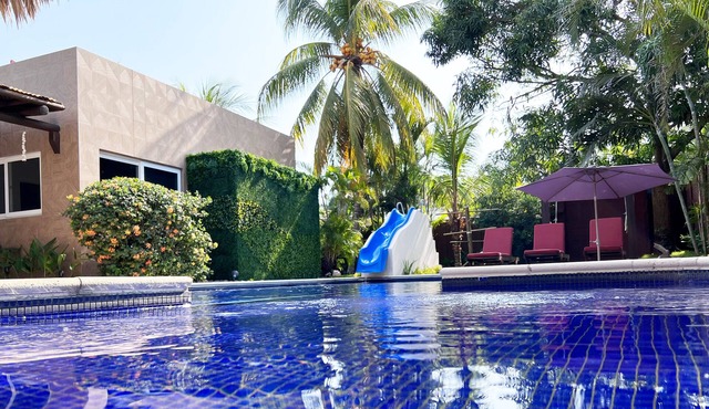 Private family house, with pool, water slide and swings.
