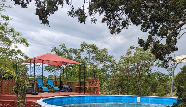 Secluded Country Home on 15 Acres. Pool, BBQ, Hot Tub and Ping Pong. Close to COTA. RV Parking