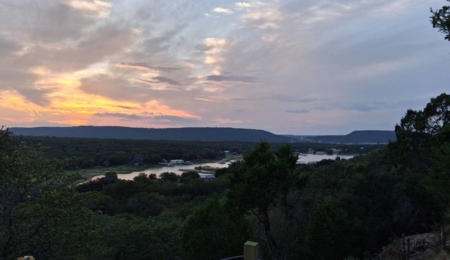 Secluded RV on mountain bluff on lake Palo Pinto, large deck. Bike,boat andswim.