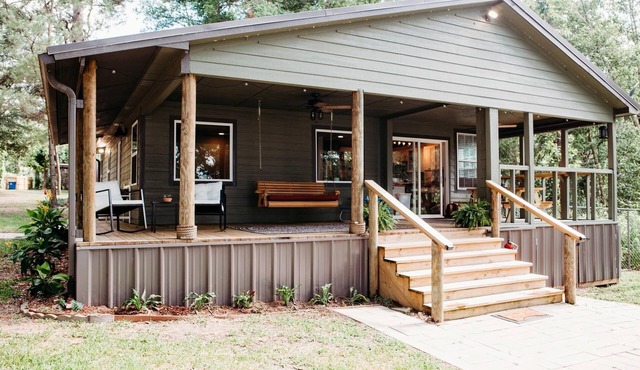 Secluded WATERFRONT CABIN with wifi, private dock with boat lift and courtyard